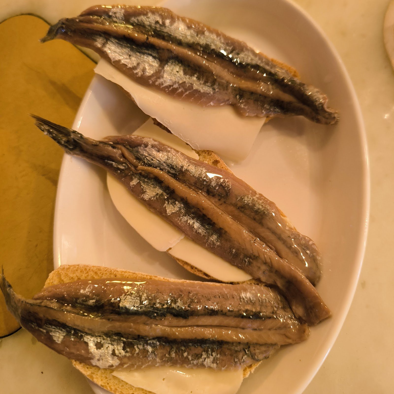 Anchovies with buttered toast