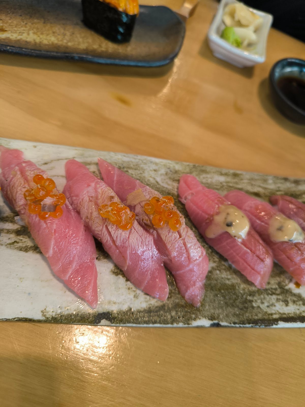 Doki Doki - Chutoro (left)  and O-toro with white truffle and mushroom (right) nigiri